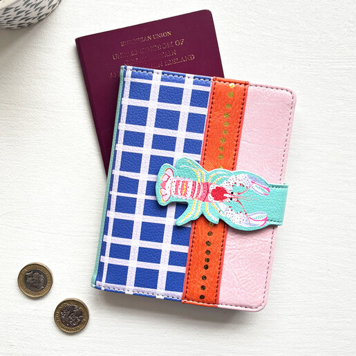 passport holder from House of Disaster's Tide collection