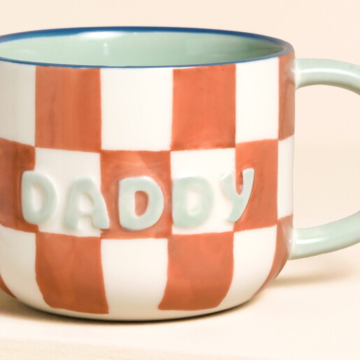 Close Up of Daddy Wording on Checked Print Mug