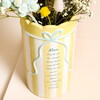 Close Up of Yellow Stripe Ceramic Scallop Edge Bow Mum Vase