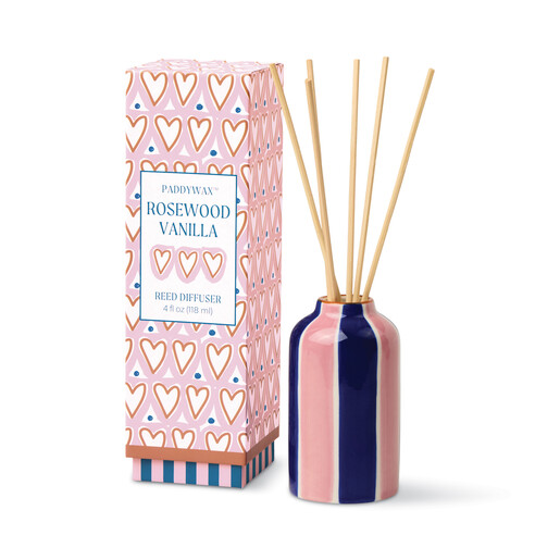 A Pink and Blue Stripe Ceramic Diffuser Bottle with Natural Reeds and a Giftable Box