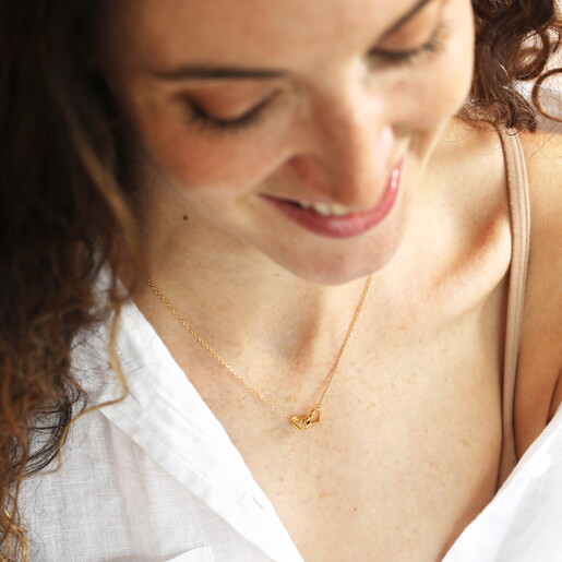 Stainless Steel Interlocking Hearts Pendant Necklace in Gold