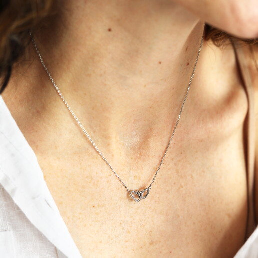 Stainless Steel Interlocking Hearts Pendant Necklace in Silver