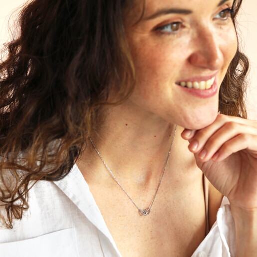 Stainless Steel Interlocking Hearts Pendant Necklace in Silver