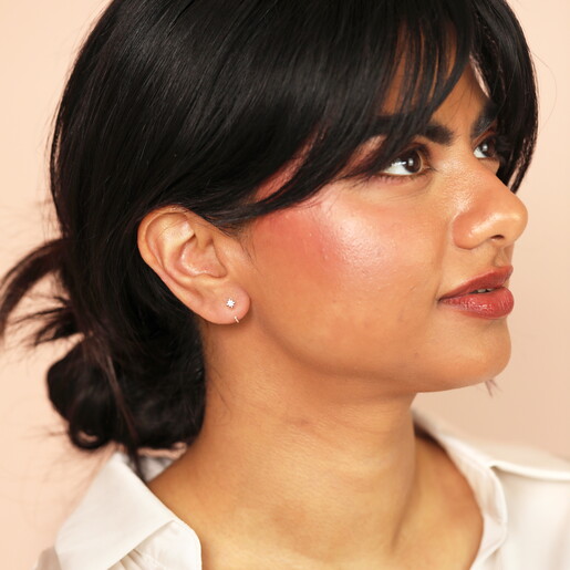 Sterling Silver Thread Through Star Huggie Hoop Earrings On Model