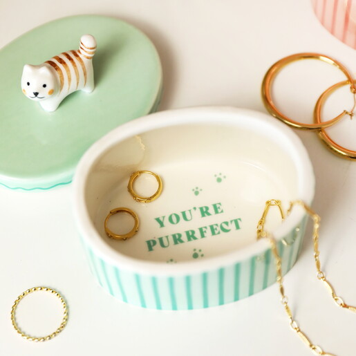 inside of ceramic cat trinket pot