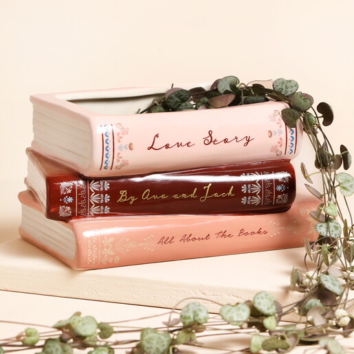 personalised book planter made of glossy ceramic