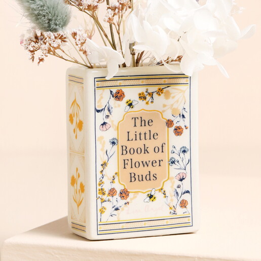 Close Up of The Little Book of Flower Buds Vase with Dried Flower Stems Inside