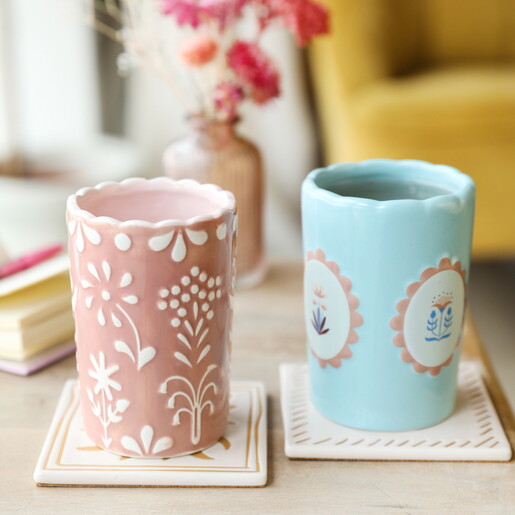 ceramic tumbler with pink and white floral d