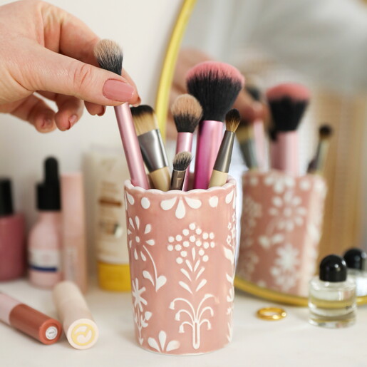 ceramic tumbler with pink and white floral d