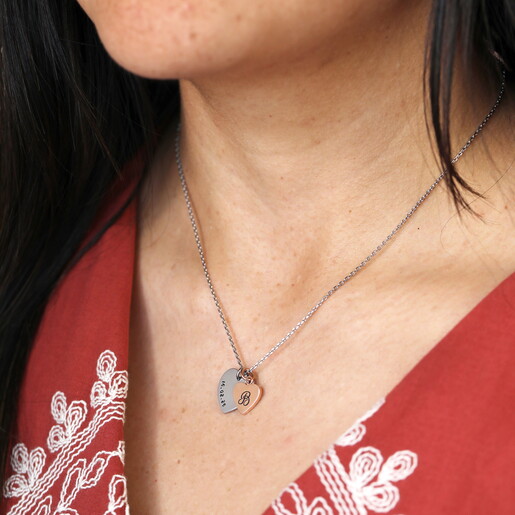 silver and gold double heart charm 