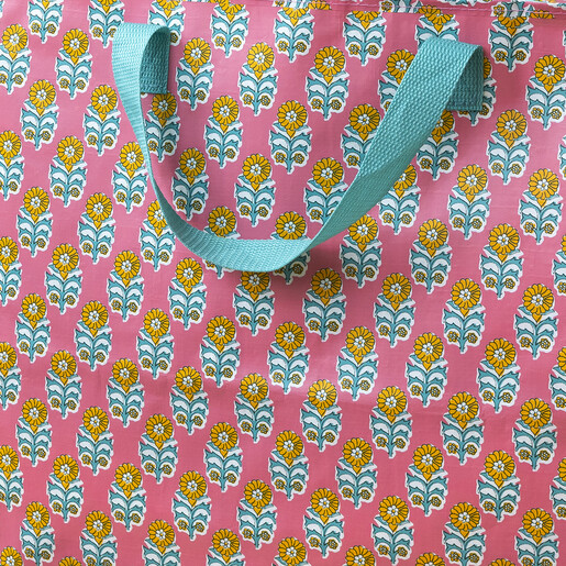 close up of floral print and blue handles