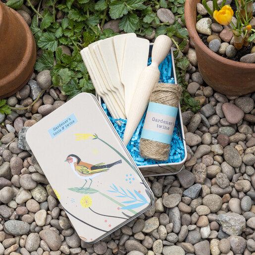 gardening set with cream tin