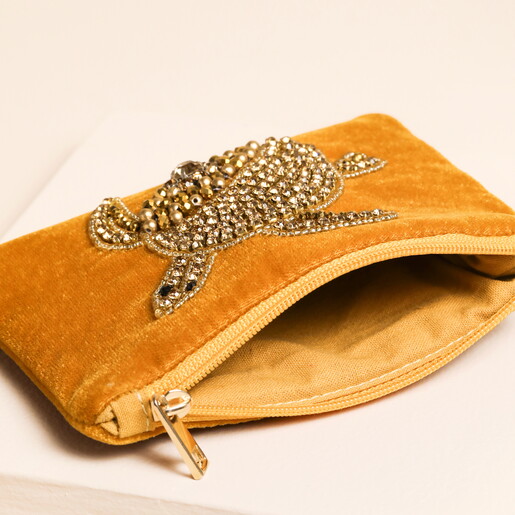 inside of velvet pouch in mustard
