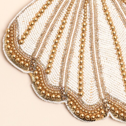 close up of shell texture in gold and white