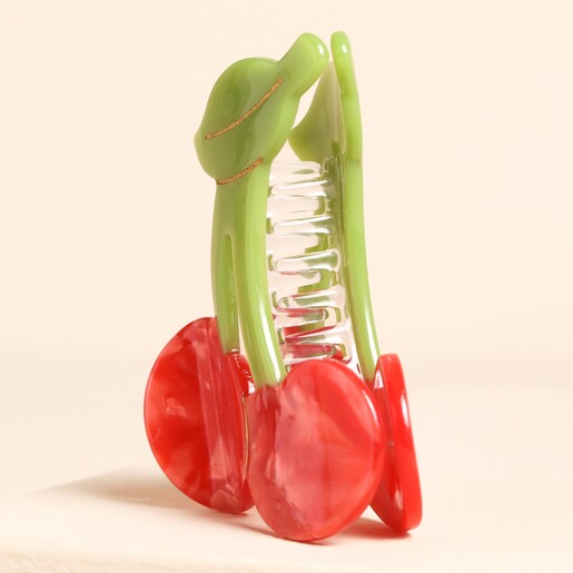 side of red cherry hair clip