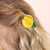 mini fruit-themed hair clip on model