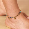 turtle pendant on model's ankle