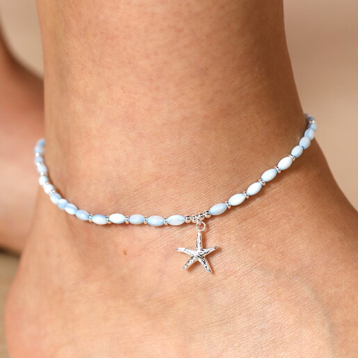 Close Up of Silver Starfish Charm on Blue Beaded Anklet