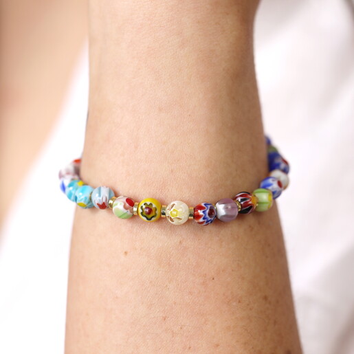 multi coloured glass beaded bracelet close up on model