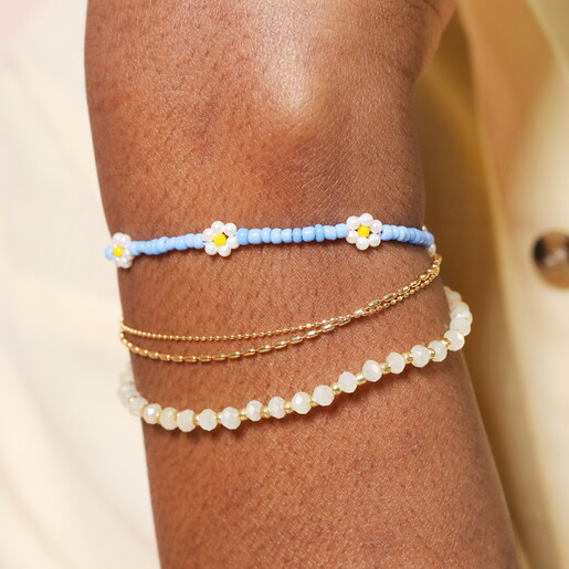 Stainless Steel Blue Beaded Flower Charm Bracelet in Gold