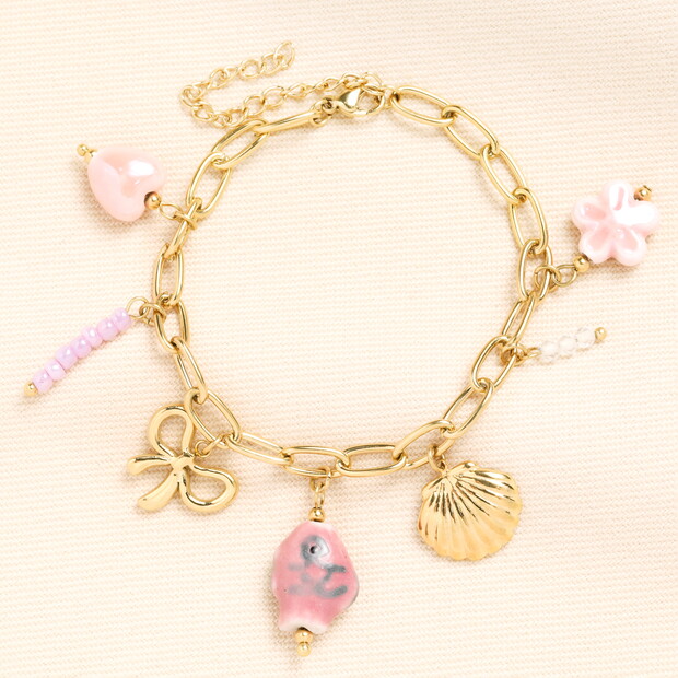 Stainless Steel Pink Shell & Bow Charm Bracelet in Gold