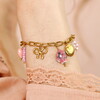 Stainless Steel Pink Shell & Bow Charm Bracelet in Gold
