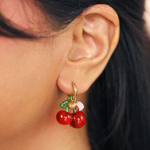 cherry charm huggie hoop earrings in gold on model