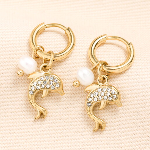 A Small Pair of Gold Hoop Earrings with Tiny Dangling Dolphin and Pearl Charms