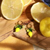 Stainless Steel Lemon Charm Hoop Earrings in Gold