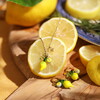 Stainless Steel Lemon Charm Hoop Earrings in Gold