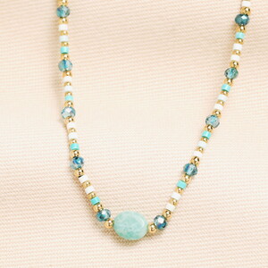 Semi-Precious Beaded Blue Oval Pendant Necklace in Gold