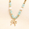green and gold stainless steel bow charm necklace