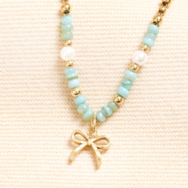 Stainless Steel Bow Charm Green Beaded Necklace in Gold