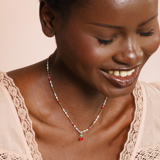 A Colourful Beaded Necklace with a Dangling Cherry Charm