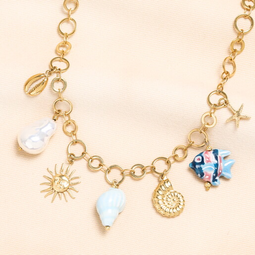 A Chunky Gold Round Link Necklace With Dangling Ocean Themed Charms Ideal for Beach Ready Style