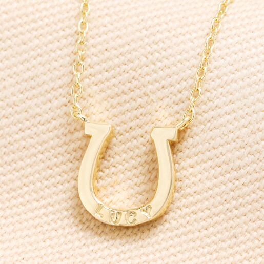 gold horseshoe charm necklace