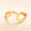 oceanic toe ring with wave design in gold