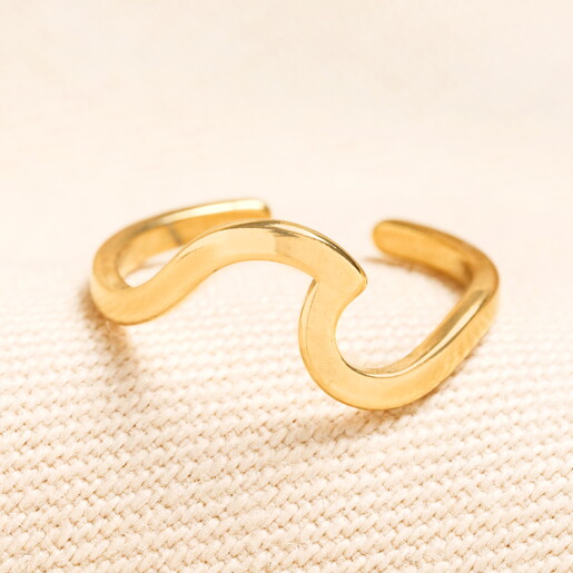 oceanic toe ring with wave design in gold