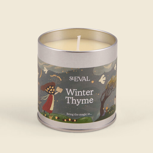 Open St Eval Winter Thyme tin candle showing poured wax and wick