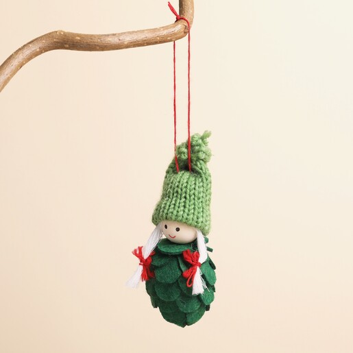 Felt Christmas tree girl hanging decoration suspended from a rustic branch