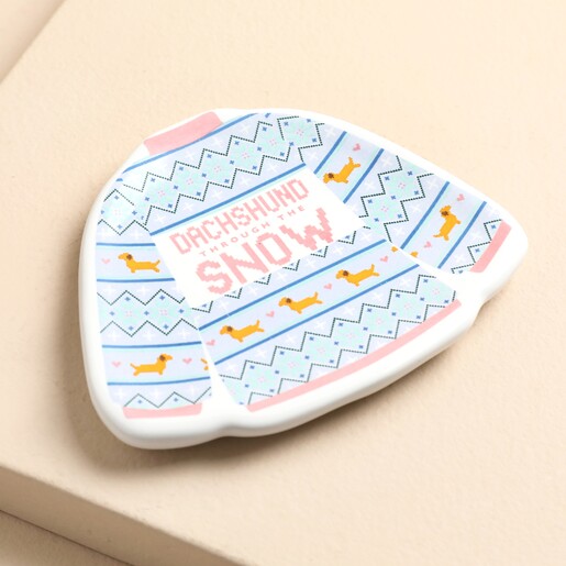 Angled view of festive jumper shaped ceramic dachshund trinket dish