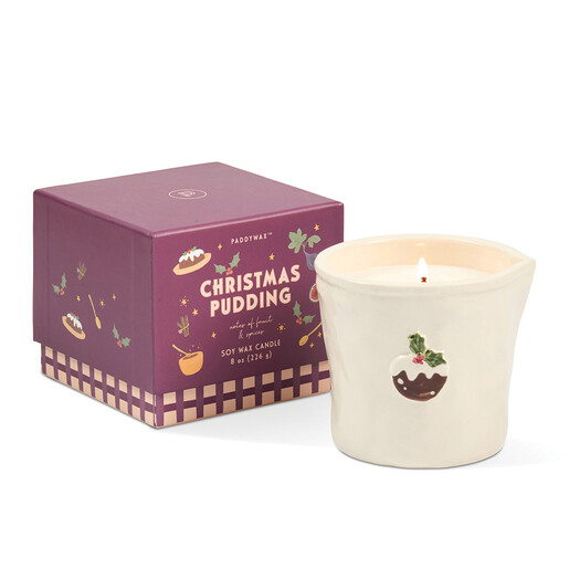 Paddywax Christmas pudding scented candle in a ceramic pot next to its gift box