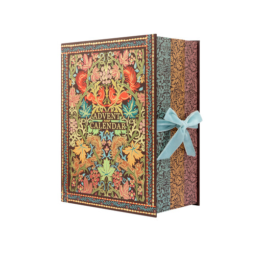 Closed William Morris advent calendar book tied with a blue velvet ribbon