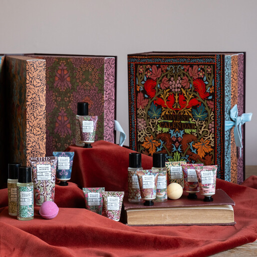 Open William Morris advent calendar displaying various pampering bath and body miniature products