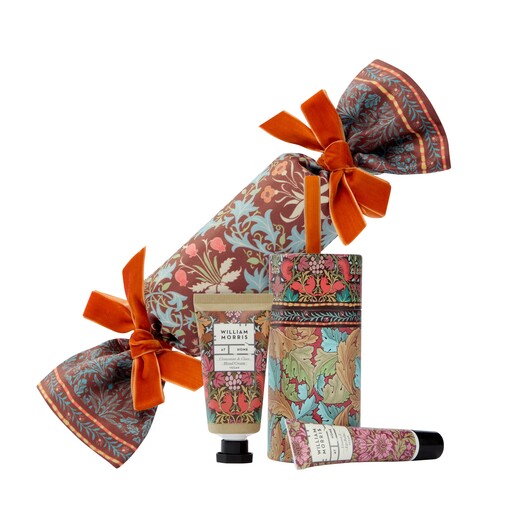 Heathcote & Ivory reusable fabric cracker tied with orange velvet bows and beauty treats