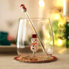 festive tumbler with snowman figurine