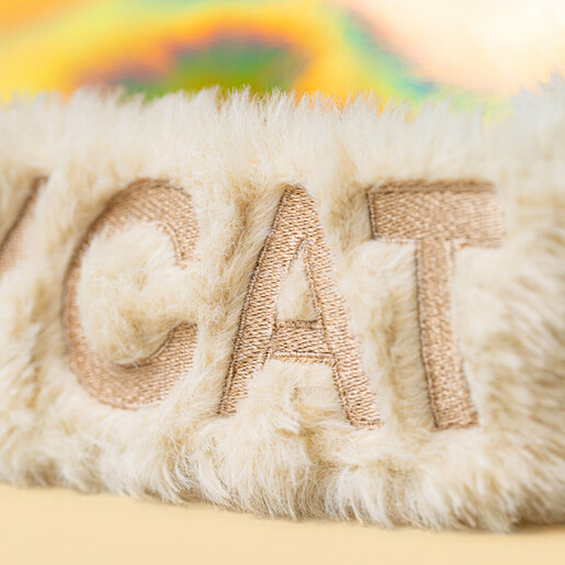 Close-up of embroidered Jellycat lettering on the cream fleece headband