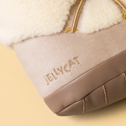 Close up of the embroidered Jellycat logo on the heel of the plush boot