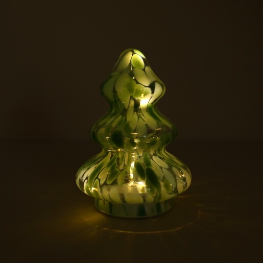 Green glass confetti Christmas tree illuminated from within by glowing LED lights