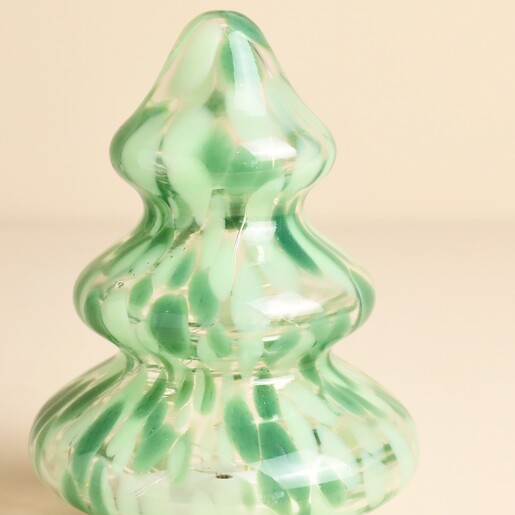 Close-up of the speckled green and white glass Christmas tree decoration